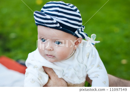 Cute little baby boy in summer garden 11097549