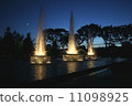 Night view of glowing fountain 11098925