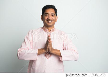 traditional young indian male with Pranamasana greetings sign on traditional young indian male with Pranamasana greetings sign on 11101733