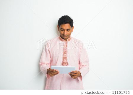 traditional indian male with tablet and plenty of copyspace 11101735