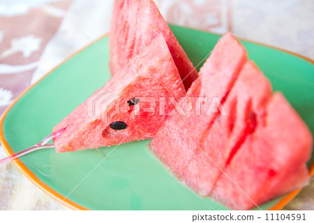 Sliced ripe watermelon on plate 11104591