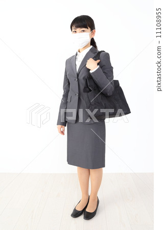 Business woman in a mask 11108955