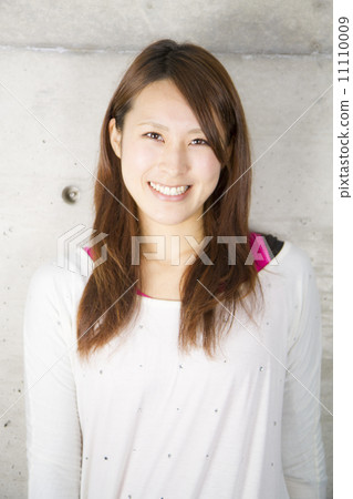 A young woman with a smile A young woman with a smile 11110009