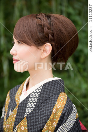 A woman in a kimono A woman in a kimono 11113227