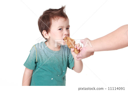 boy eating chicken boy eating chicken 11114091
