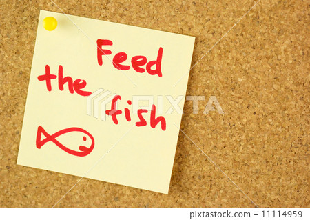 Feed the fish remind sticker on cork Feed the fish remind sticker on cork 11114959
