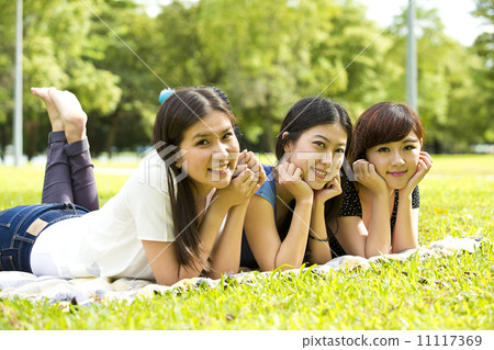 Girl friends in park having fun Girl friends in park having fun 11117369