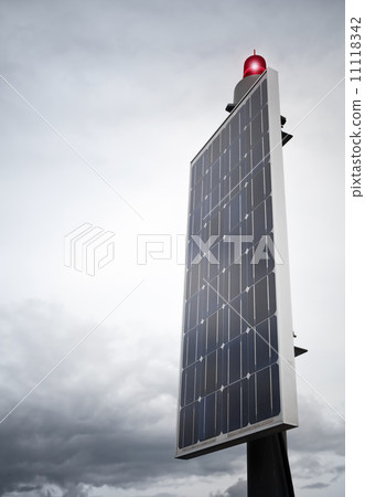 Small navigation sign with red light and solar batter. Small marina of Imatra town, Finland 11118342