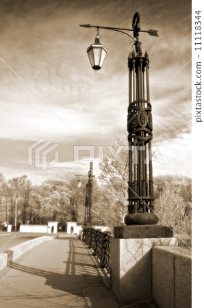 Street lanterns on the bridge in Saint-Petersburg, Russia. Vintage stylized photo. Street lanterns on the bridge in Saint-Petersburg, Russia. Vintage stylized photo. 11118344
