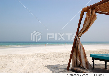 Hut on the beach of luxury hotel, Ajman, UAE 11118416