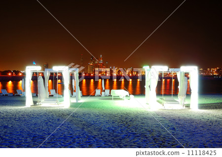 Night illumination of the luxury hotel on Palm Jumeirah man-made 11118425