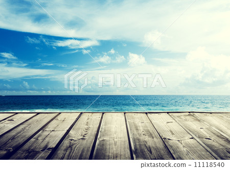 tropical beach and wooden platform 11118540