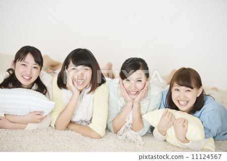A woman who lies on the floor and smiles 11124567