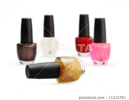 colorful nail polish set on white background isolated 11125761
