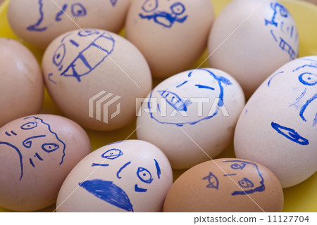 Face painted eggs in a dish Face painted eggs in a dish 11127704