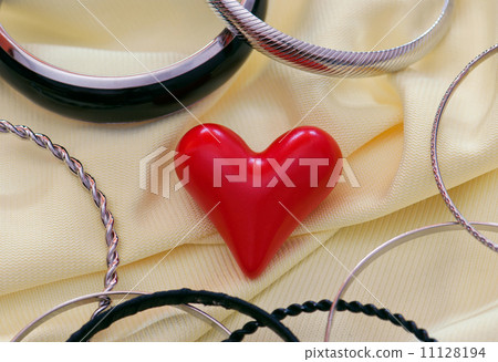 Red heart with various bracelets Red heart with various bracelets 11128194