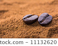 closeup of coffee beans at roasted coffee heap 11132620