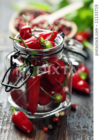 chili peppers with herbs and spices chili peppers with herbs and spices 11133719