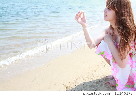 Half beautiful woman in summer beach 11140173