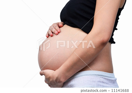 Woman holding her pregnant Woman holding her pregnant 11141688