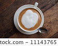 a cup of cappucino on wooden table 11143765