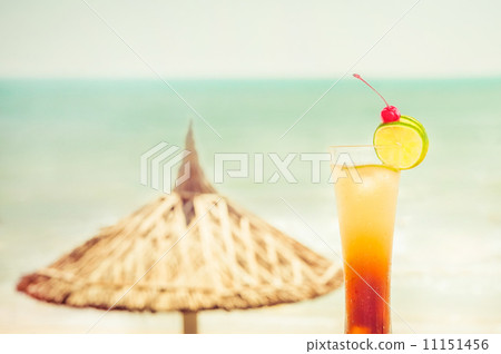 Long Island cocktail with fruits decoration at tropics Long Island cocktail with fruits decoration at tropics 11151456