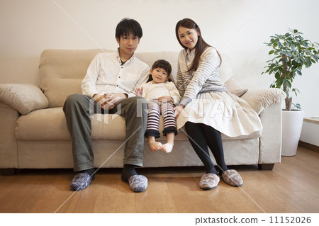 A family relaxing in the living room A family relaxing in the living room 11152026