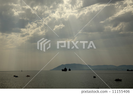 Cloudy seascape with clouds and sun Cloudy seascape with clouds and sun 11155406