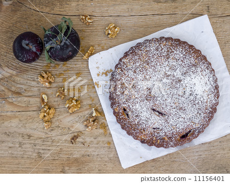 Plum pie with walnuts Plum pie with walnuts 11156401