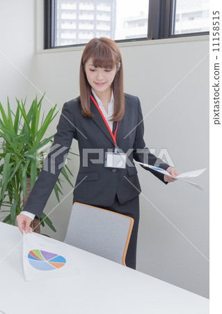 Female employees who distribute materials 11158515