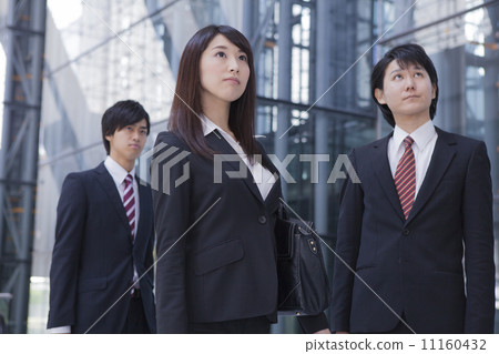 Businessman and Businesswoman looking in the same direction Businessman and Businesswoman looking in the same direction 11160432