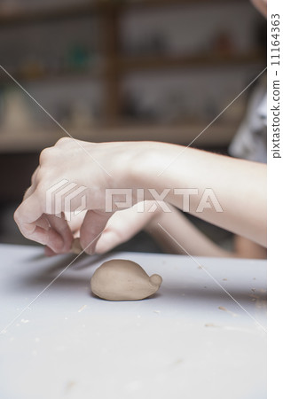 Girl make toyfrom clay Girl make toyfrom clay 11164363