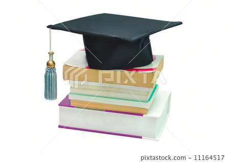 Graduation cap on top of a stack of books Graduation cap on top of a stack of books 11164517