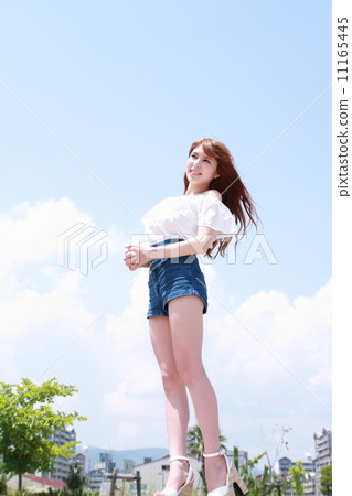 Summer blue sky and half beautiful woman Summer blue sky and half beautiful woman 11165445