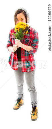 Young woman smelling bouquet of sunflowers Young woman smelling bouquet of sunflowers 11166429