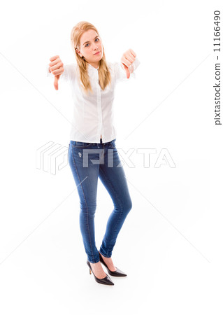 Young woman showing thumbs down sign with both hands Young woman showing thumbs down sign with both hands 11166490