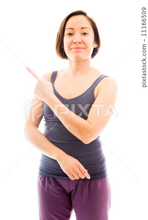 Young woman standing and showing something Young woman standing and showing something 11166509