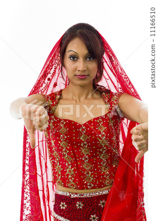 Young Indian woman showing thumbs down sign from both hands 11166510