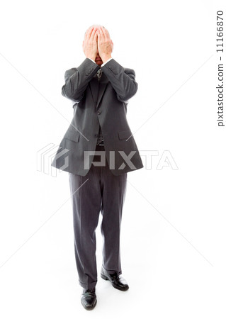 Businessman crying in grief Businessman crying in grief 11166870