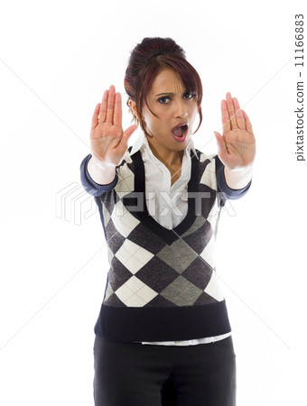 Indian businesswoman making stop gesture and showing stop Indian businesswoman making stop gesture and showing stop 11166883