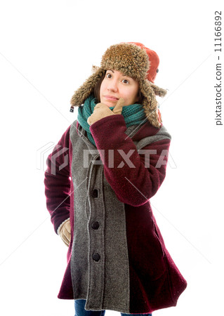 Young woman in warm clothing and thinking 11166892