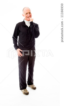 Senior man standing with finger in mouth 11166930