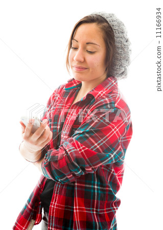 Young woman reading text message on phone Young woman reading text message on phone 11166934