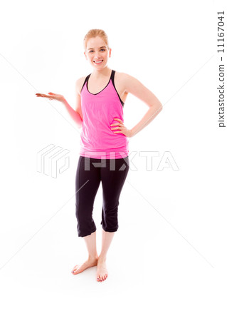 Young woman showing something and smiling Young woman showing something and smiling 11167041