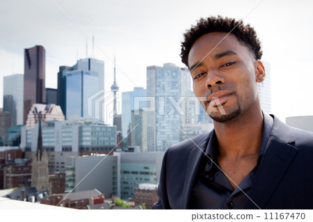 Attractive afro-american business man posing in studio 11167470