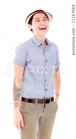 Young woman laughing with her hands in pockets 11167669