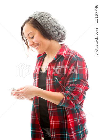 Young woman text messaging on mobile phone 11167746