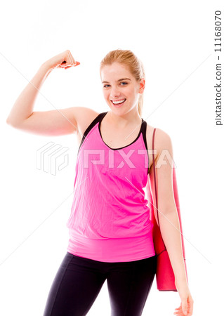 Young woman showing off her muscle 11168070
