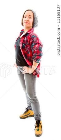 Young woman standing with her arms akimbo Young woman standing with her arms akimbo 11168137