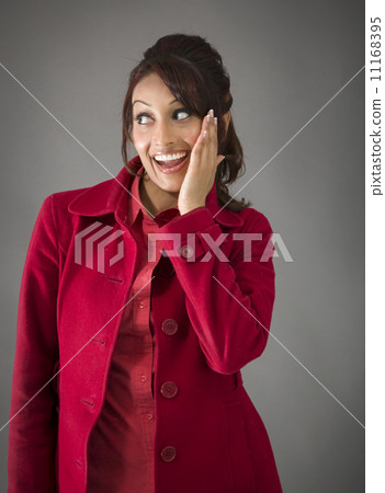 Surprised Indian woman with opened mouth looking happy isolated on colored background Surprised Indian woman with opened mouth looking happy isolated on colored background 11168395